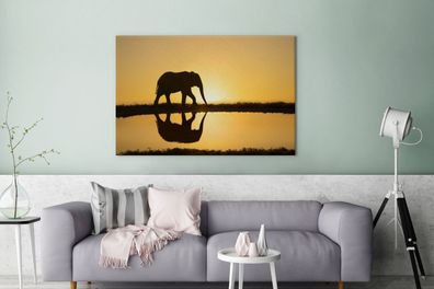 Leinwandbilder - 120x80 cm - Silhouette eines Elefanten bei Sonnenuntergang