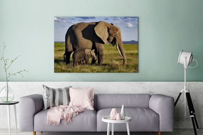 Leinwandbilder - 140x90 cm - Mutter und Baby-Elefant durch die Savanne