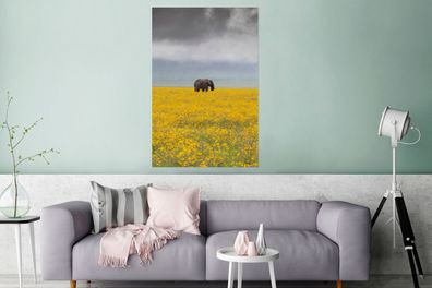 Glasbilder - 80x120 cm - Elefant in einem gelben Blumenfeld (Gr. 80x120 cm)