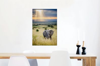 Leinwandbilder - 60x90 cm - Sonnenstrahlen über einem Elefanten in der Savanne
