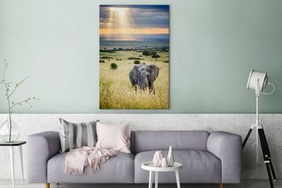 Leinwandbilder - 90x140 cm - Sonnenstrahlen über einem Elefanten in der Savanne
