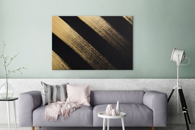 Leinwandbilder - 120x80 cm - Goldene Farbstreifen auf schwarzem Hintergrund