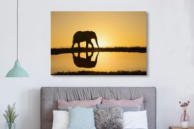 Leinwandbilder - 150x100 cm - Silhouette eines Elefanten bei Sonnenuntergang