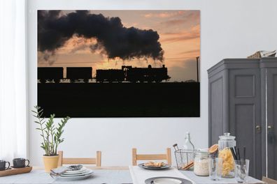 Leinwandbilder - 150x100 cm - Eine Dampflokomotive bei Sonnenuntergang
