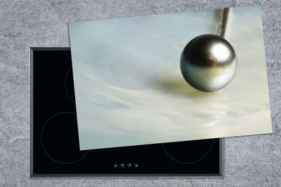 Herdabdeckplatte - 78x52 cm - Nahaufnahme einer Perle