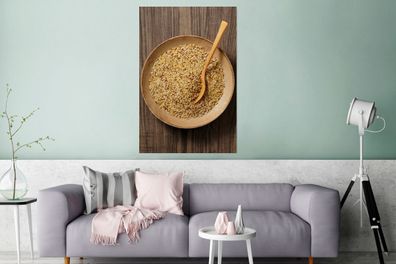 Glasbilder - 80x120 cm - Eine rustikale Holzschale mit Quinoa und Holzlöffel
