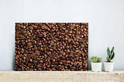 Glasbilder - 30x20 cm - Hellbraune Kaffeebohnen in einem Stapel (Gr. 30x20 cm)