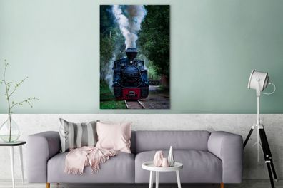 Leinwandbilder - 80x120 cm - Eine Dampflokomotive in den grünen Wäldern