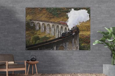 Gartenposter - 180x120 cm - Eine Dampflokomotive über eine charakteristische Brücke