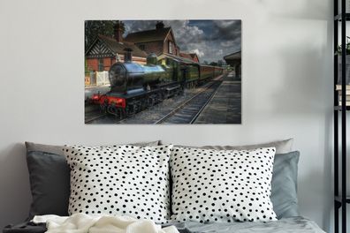 Leinwandbilder - 90x60 cm - Eine Dampflokomotive in einem malerischen Dorf