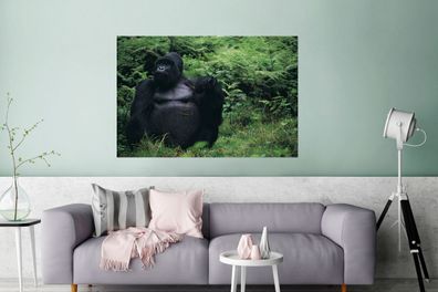 Glasbilder - 120x80 cm - Ein riesiger Gorilla in einem grünen Regenwald