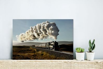 Glasbilder - 30x20 cm - Eine Dampflokomotive fährt durch eine zerklüftete Landschaft