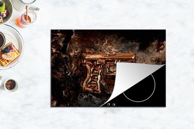 Herdabdeckplatte - 78x52 cm - Pistole - Gold - Schwarz