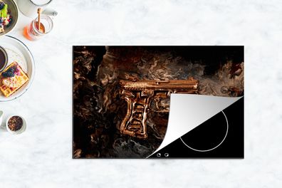 Herdabdeckplatte - 80x52 cm - Pistole - Gold - Schwarz