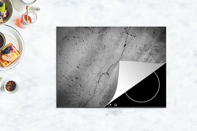 Herdabdeckplatte - 70x52 cm - Betonwand mit einem Riss - schwarz und weiß