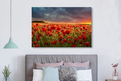 Leinwandbilder - 150x100 cm - Sonnenuntergang über einem Feld von Mohnblumen