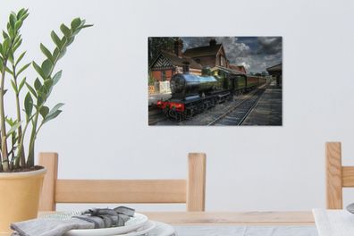 Leinwandbilder - 30x20 cm - Eine Dampflokomotive in einem malerischen Dorf