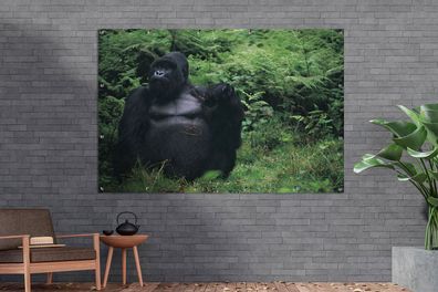 Gartenposter - 180x120 cm - Ein riesiger Gorilla in einem grünen Regenwald