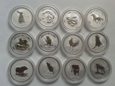 12 x 1$ 1999-2010 Australien Lunarset 12 Münzen je 31,1g Feinsilber 12 Unzen Silber