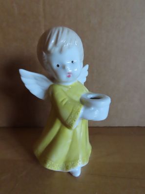 Figur Engel gelbes Kleid hält Schale für Kerze ca. 10 cm hoch / schaut nach rechts