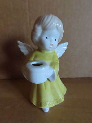 Figur Engel gelbes Kleid hält Schale für Kerze ca. 10 cm hoch schaut nach links