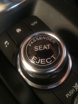 Emblem passenger seat eject PSE