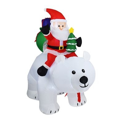 Riesiger aufblasbarer Weihnachtsmann, der Eisbären reitet