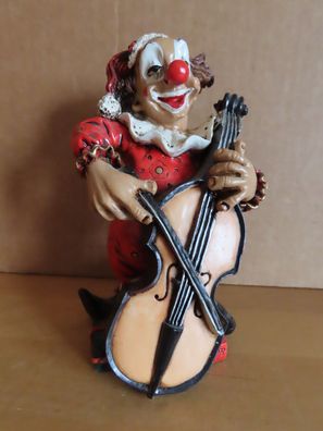 Figur Clown mit Cello rote Kleidung Weihnachtsmütze Geschenke ca. 13,5 cm hoch