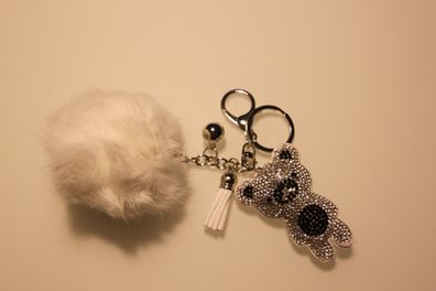 Schlüssel- Taschenanhänger Bär mit Strasssteinen & Fellpuschel Weiß