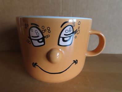 große Tasse mit Gesicht lächelt orange Müslischale Eurohome