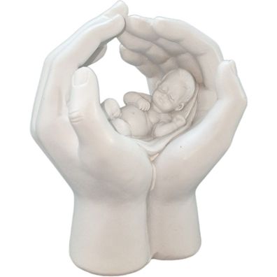 Hand mit schlafenden Baby