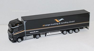 Herpa 953504 MB Actros ´18 Bigsp. Lowl.-Koffer-Sattel - aircargo trucking u. handling