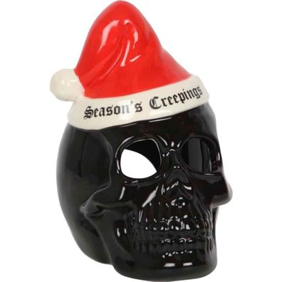 Totenkopf mit Weihnachtsmütze als Teelichthalter