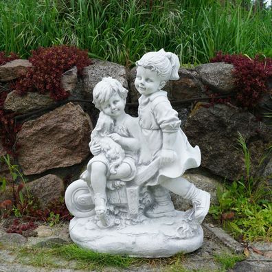 Massive Statue Steinfigur Junge und Mädchen mit Schubkarre Steinguss frostfest