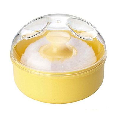 Puderquastenschwamm: Gelber Kosmetikbehälter