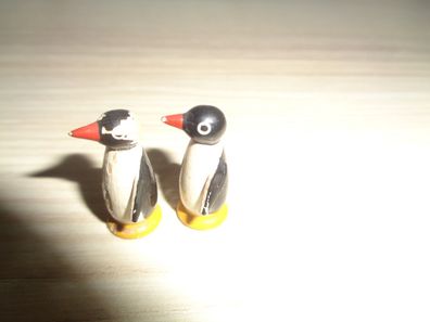 2 kleine Pinguine aus Sammlung mit Farbabrieb