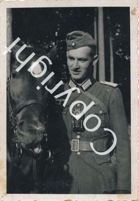 Foto WK2 - Soldat mit seinem Pferd X64
