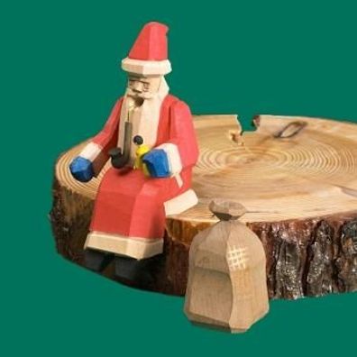 Räuchermann Weihnachtsmann sitzt an der Kannte geschnitzt Höhe 12cm NEU