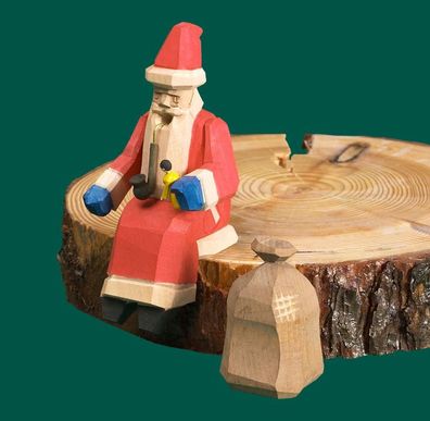 Räuchermann Weihnachtsmann sitzt an der Kannte geschnitzt Höhe 15cm NEU