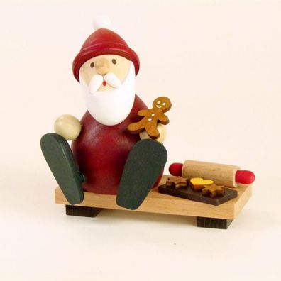 Holzfigur Weihnachtsmann mit Lebkuchen auf Bank HxB 9x9,5cm NEU Seiffen