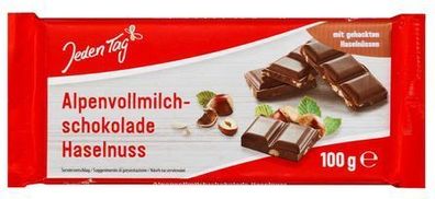 Alpenvollmilch Schokolade verfeinert mit ganzen, knackigen Haselnüssen je 100g