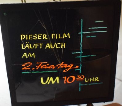 Kinowerbung Glasplatte Dia 8 x 8cm - Dieser Film läuft auch