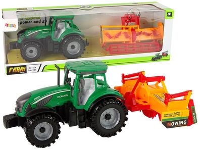 Gréner Traktor mit orangefarbenem Grubber fér Kinder