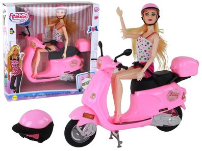 Set bestehend aus einer Puppe auf einem rosa Roller mit beweglichen Elementen