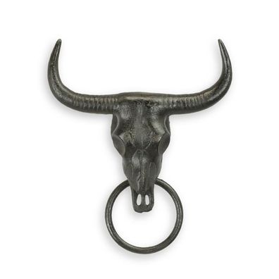 A CAST IRON BULL SKULL TOWEL HOLDER