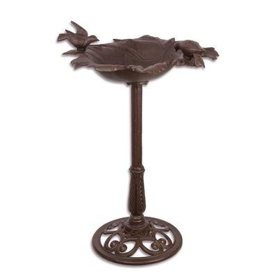 A CAST IRON BIRD BATH