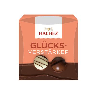 Hachez Glücksverstärker vier kleine Schokoladenpralinen Packung 40g