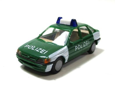 Praline 1/87 Modellauto PKW 5714 Ford Escort Polizei OVP (46-20)