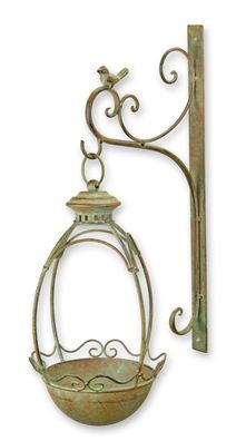 A WALL MOUNT IRON BIRD FEEDER