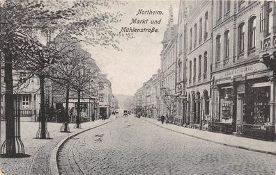 Northeim Markt und Mühlenstrasse Geschäfte Niedersachsen Postkarte AK 1918